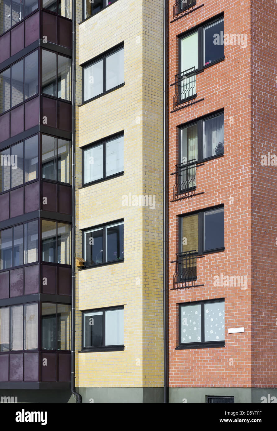 Windows of a multiroom apartment house Stock Photo