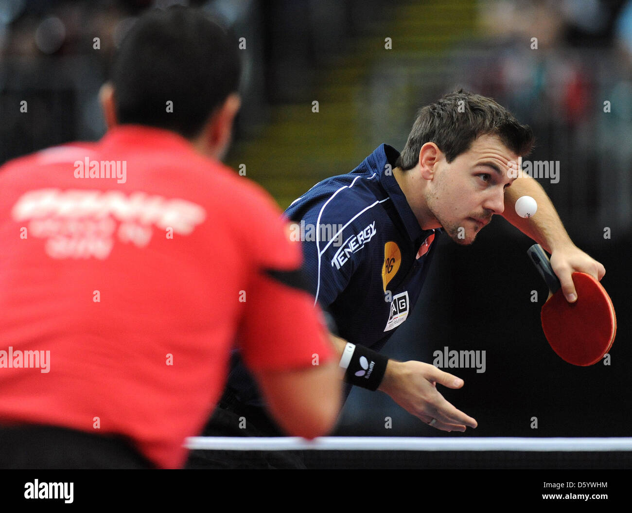 Germany's Timo Boll serves against Singapore's Ning Gao during the men