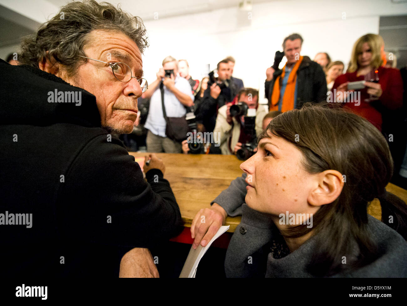 New York rock star Lou Reed (L) chats with a visitor during the opening ...