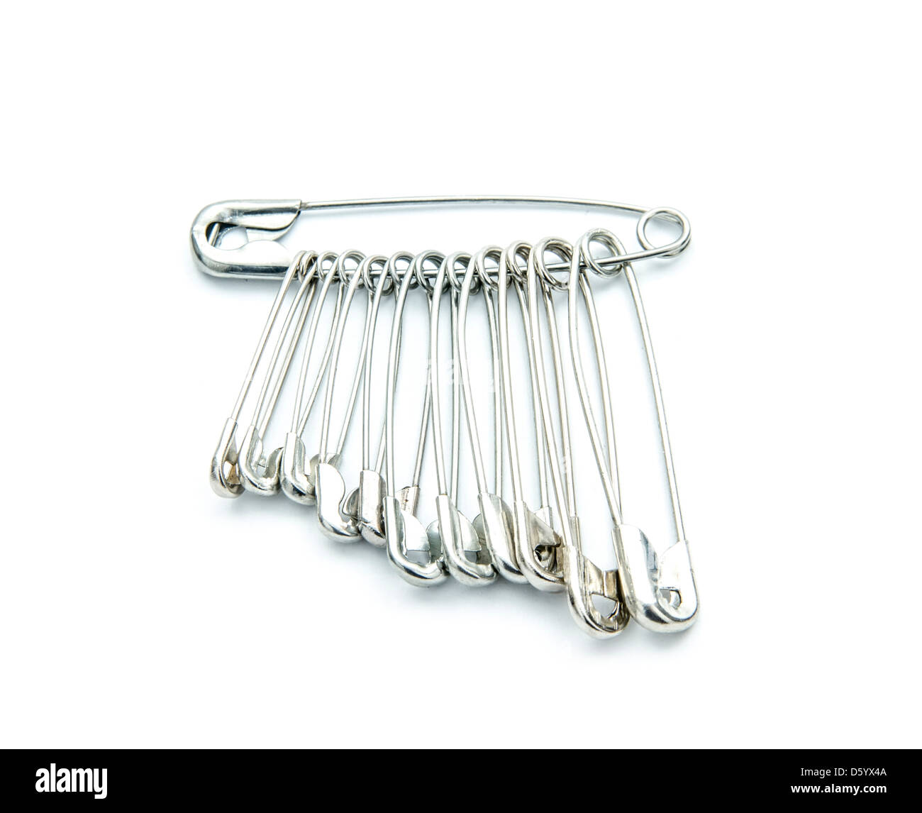 Seven colorful sewing pins on a white background, Stock image