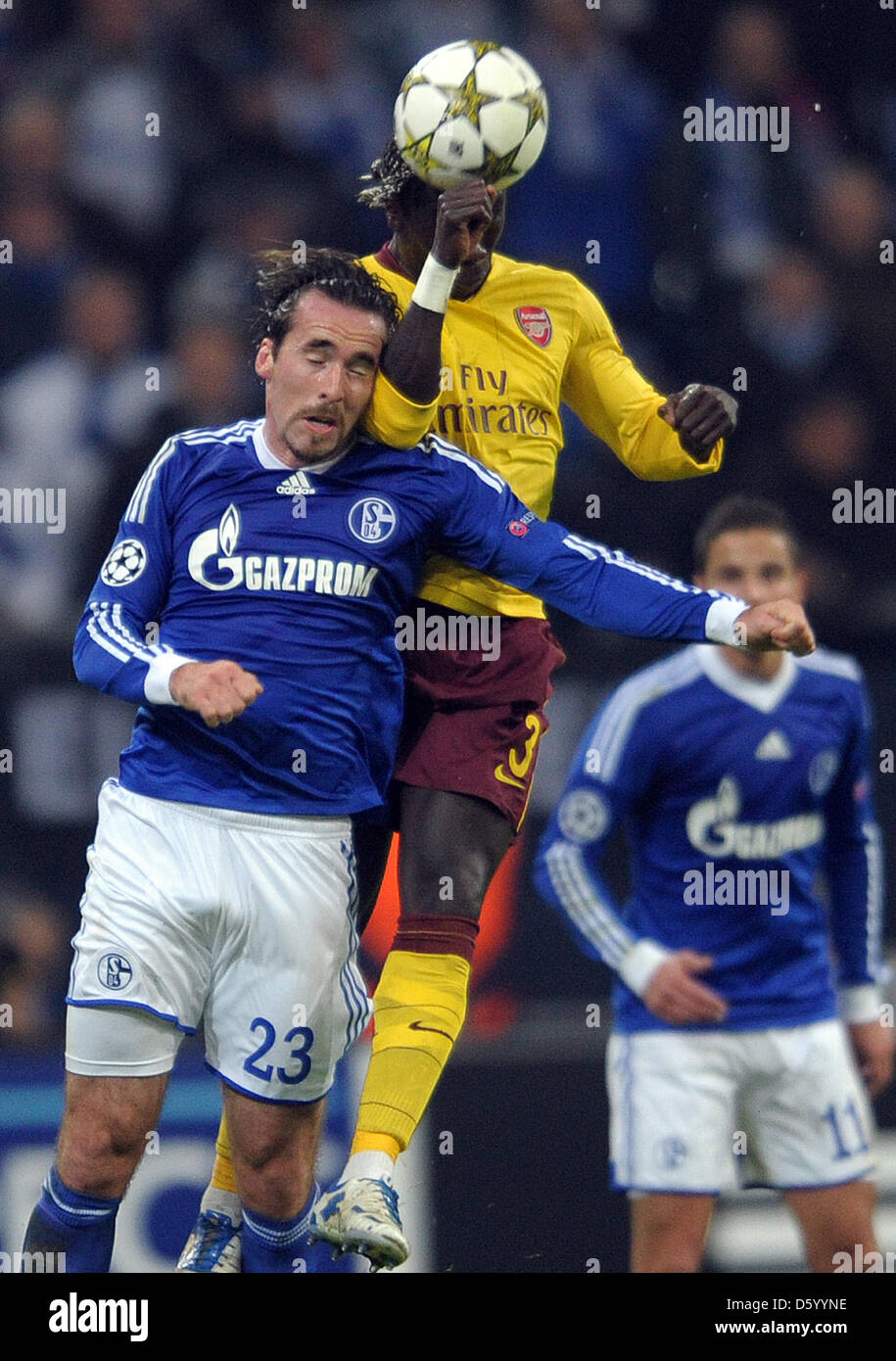 Schalke's Christian Fuchs (L) vies for the ball with Arsenal's Bacary Sagna during their Champions League Group B soccer match between FC Schalke 04 and Arsenal FC at Stadion Gelsenkirchen, Gelsenkirchen, 06 November 2012. Photo: Federico Gambarini/dpa Stock Photo
