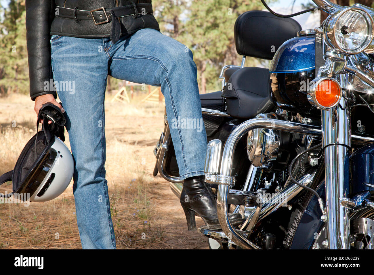 Womans leg rests motorcycle foot rest Stock Photo Alamy