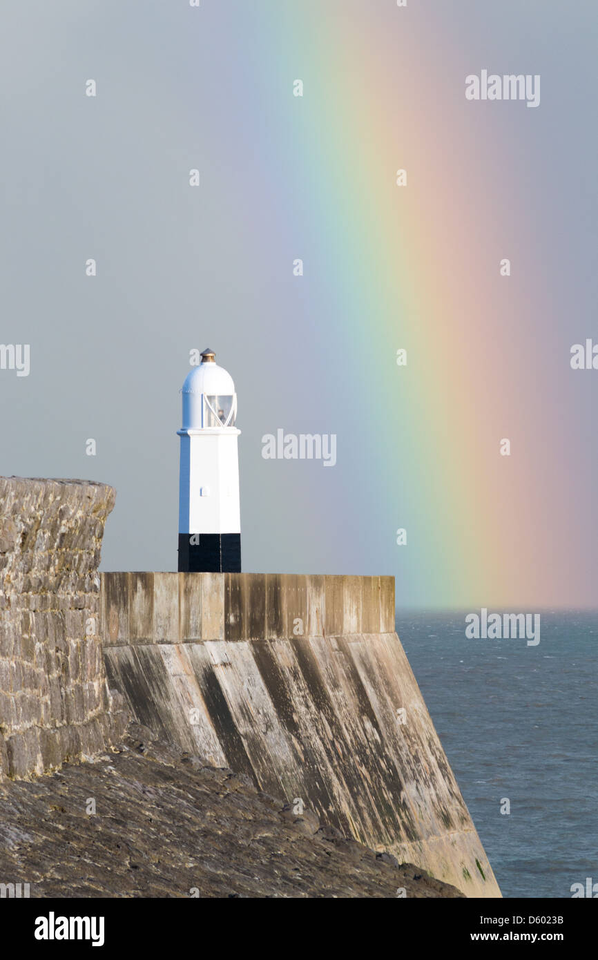 Rainbow at Porthcawl lighthouse Stock Photo