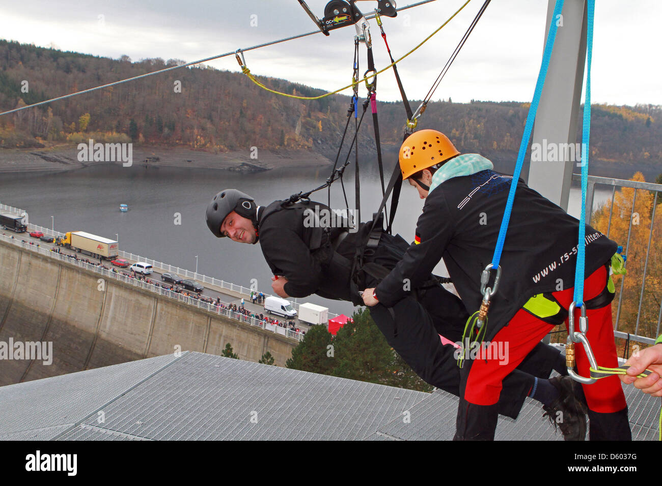 A man is about to slide down a 1000m long wire rope, reaching a speed of up  to 90 km/h in Wendfurth, Germany, 11 November 2012. According to the  operating company this