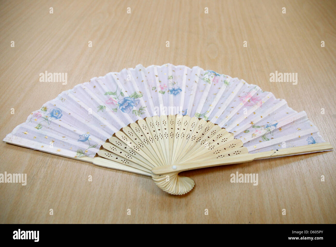 A Chinese fan flower pattern pink color. Stock Photo