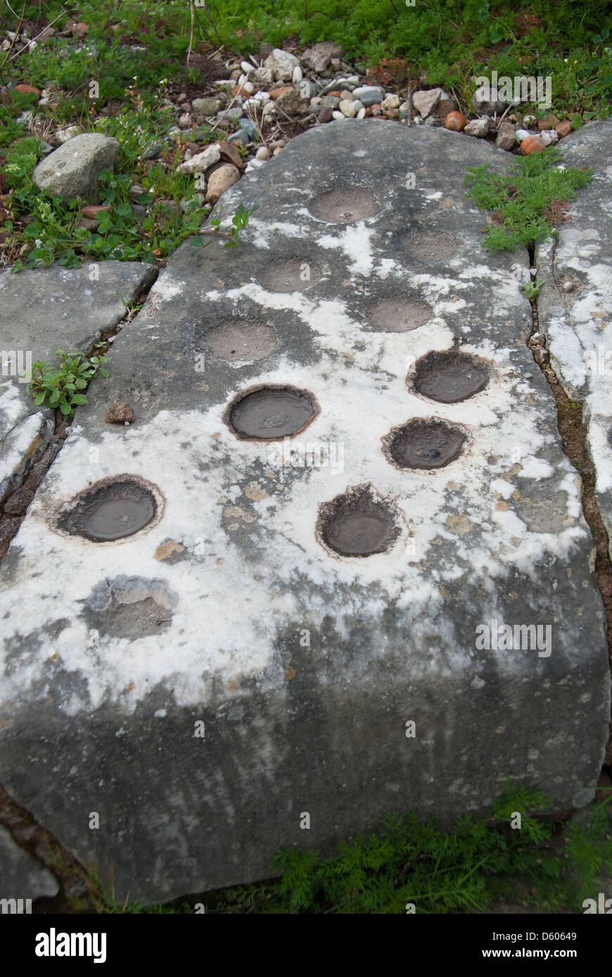 ROME, ITALY. An ancient Roman game board carved into the marble steps of the Basilica Julia in the Forum. 2013. Stock Photo