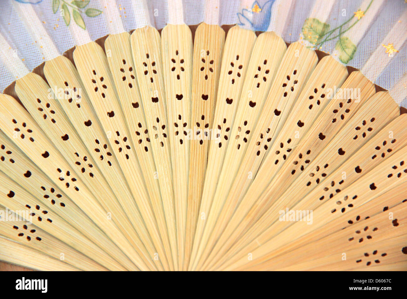 A Chinese fan flower pattern pink color made of woods. Stock Photo
