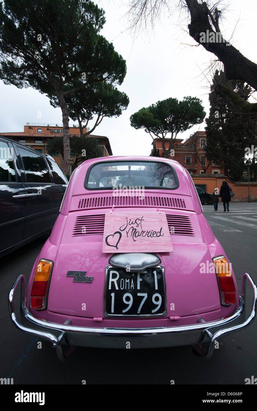 ROME, ITALY. Rear view of a pink Fiat 500L with 'Just married' sign. 2013. Stock Photo