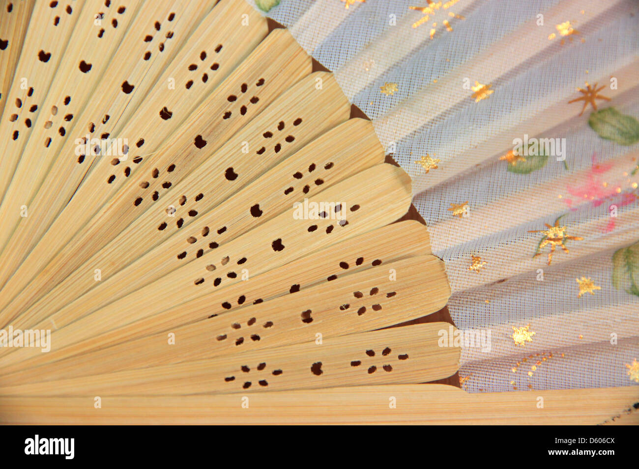 A Chinese fan flower pattern pink color made of woods. Stock Photo