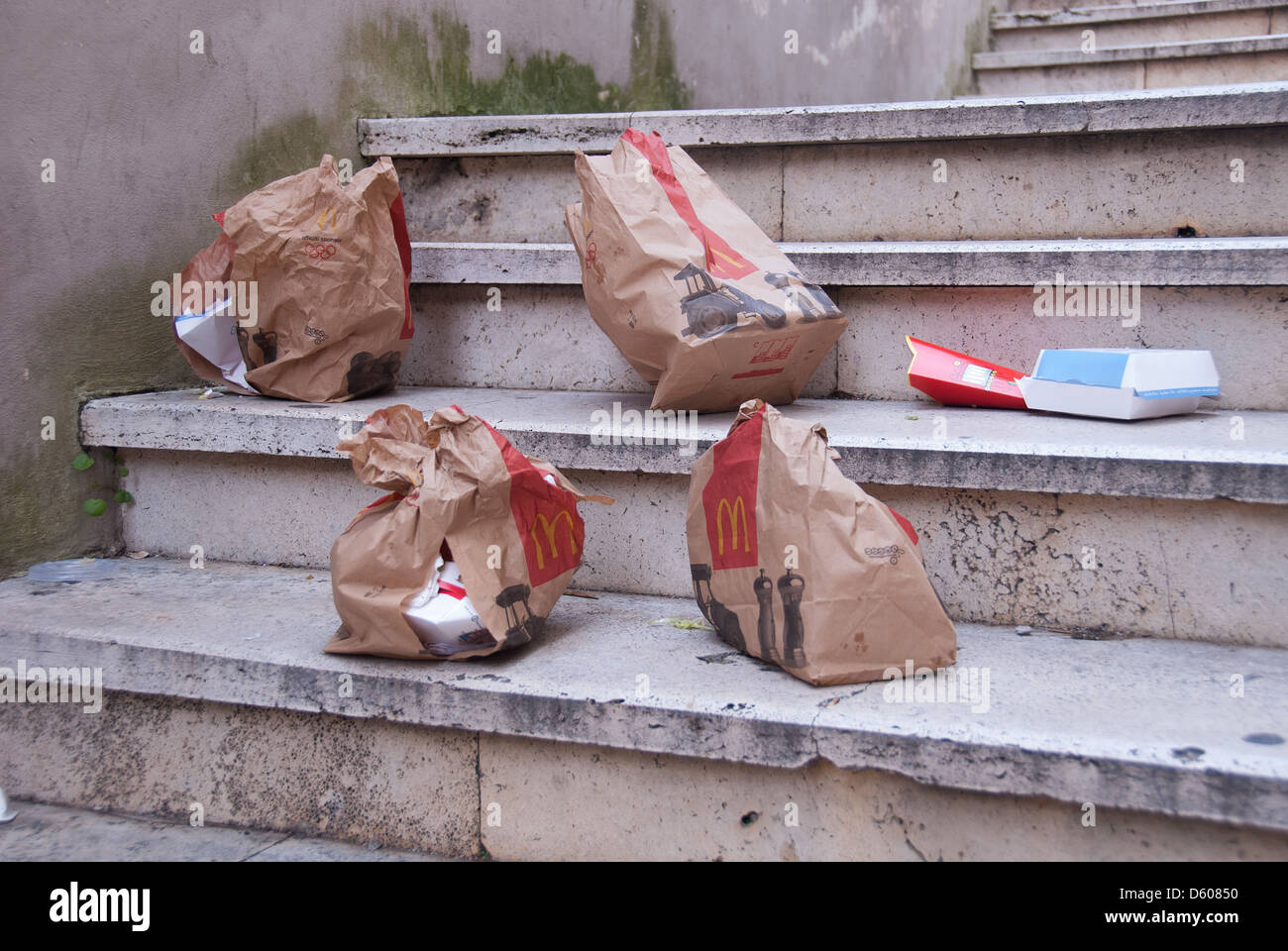 Fast food packaging left in the street. 2013. Stock Photo