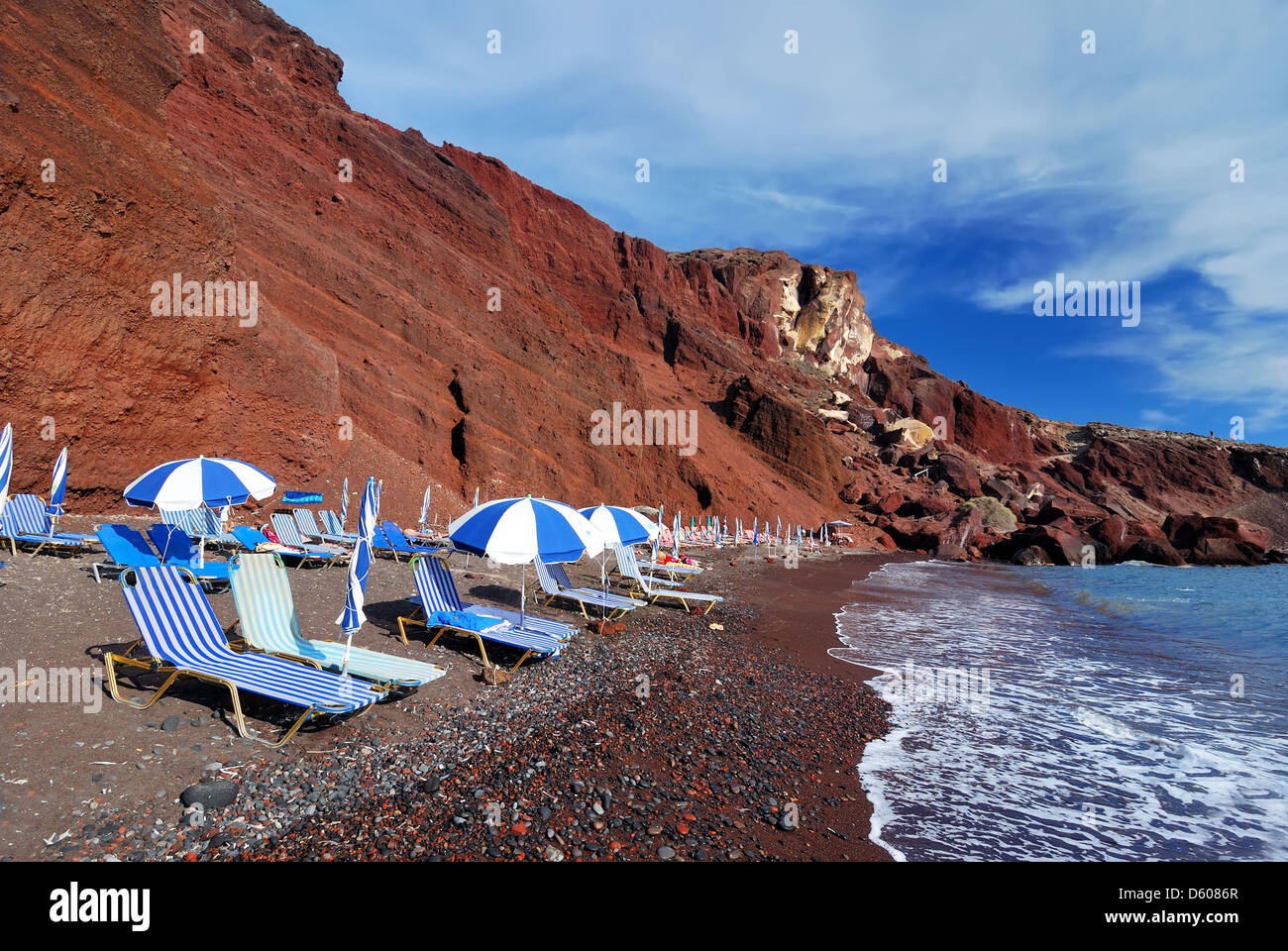 Red beach is one of the most beautiful and famous beaches of Santorini.  Black and red volcanic pebbles and hot water. Greece Stock Photo - Alamy
