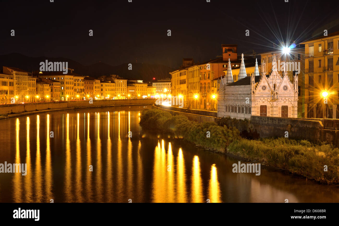 Arno river in night and Santa Maria Church, Pisa, Tuscany, Italy Stock Photo