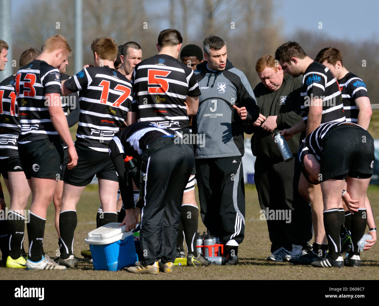 half-time talk by the coach in the rugby union match between broughton park and hoylake Stock Photo