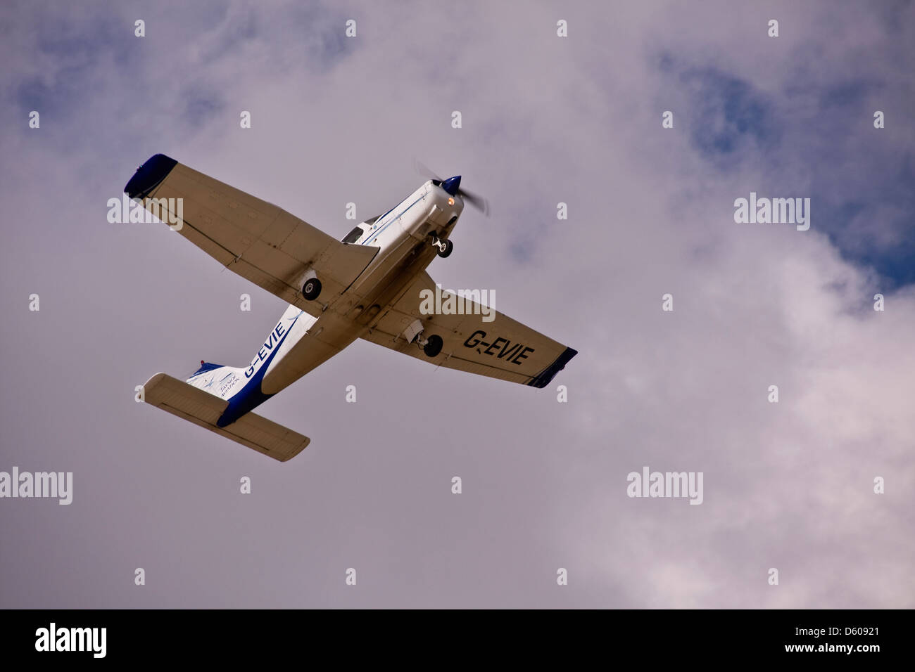 Tayside Aviation Piper PA-28 Warrior G-EVIE light monoplane taking off from the Dundee airport, UK Stock Photo
