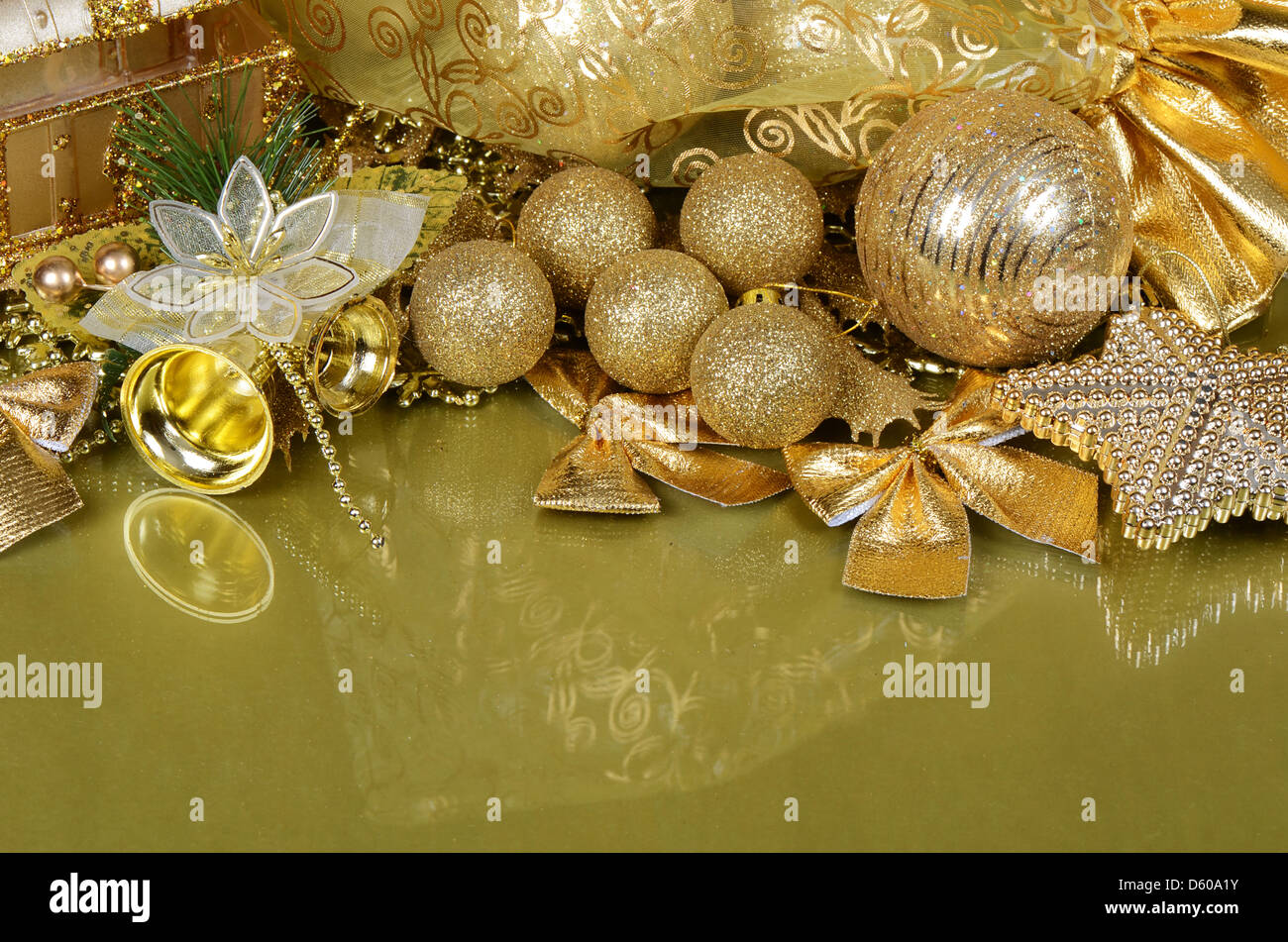 The christmas tree ornaments on gold Stock Photo - Alamy