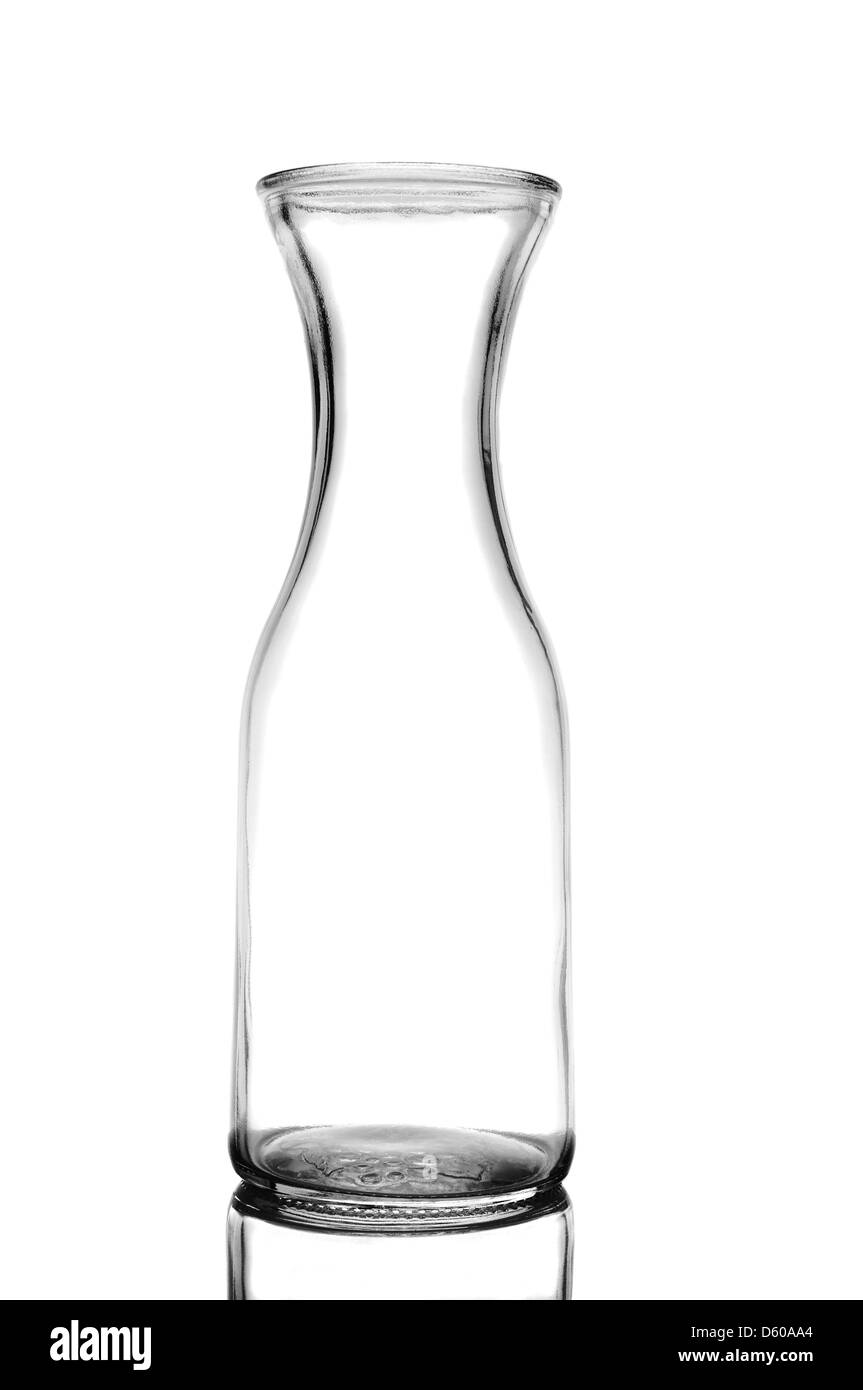 Closeup of a glass wine carafe isolated on white with reflection. Stock Photo