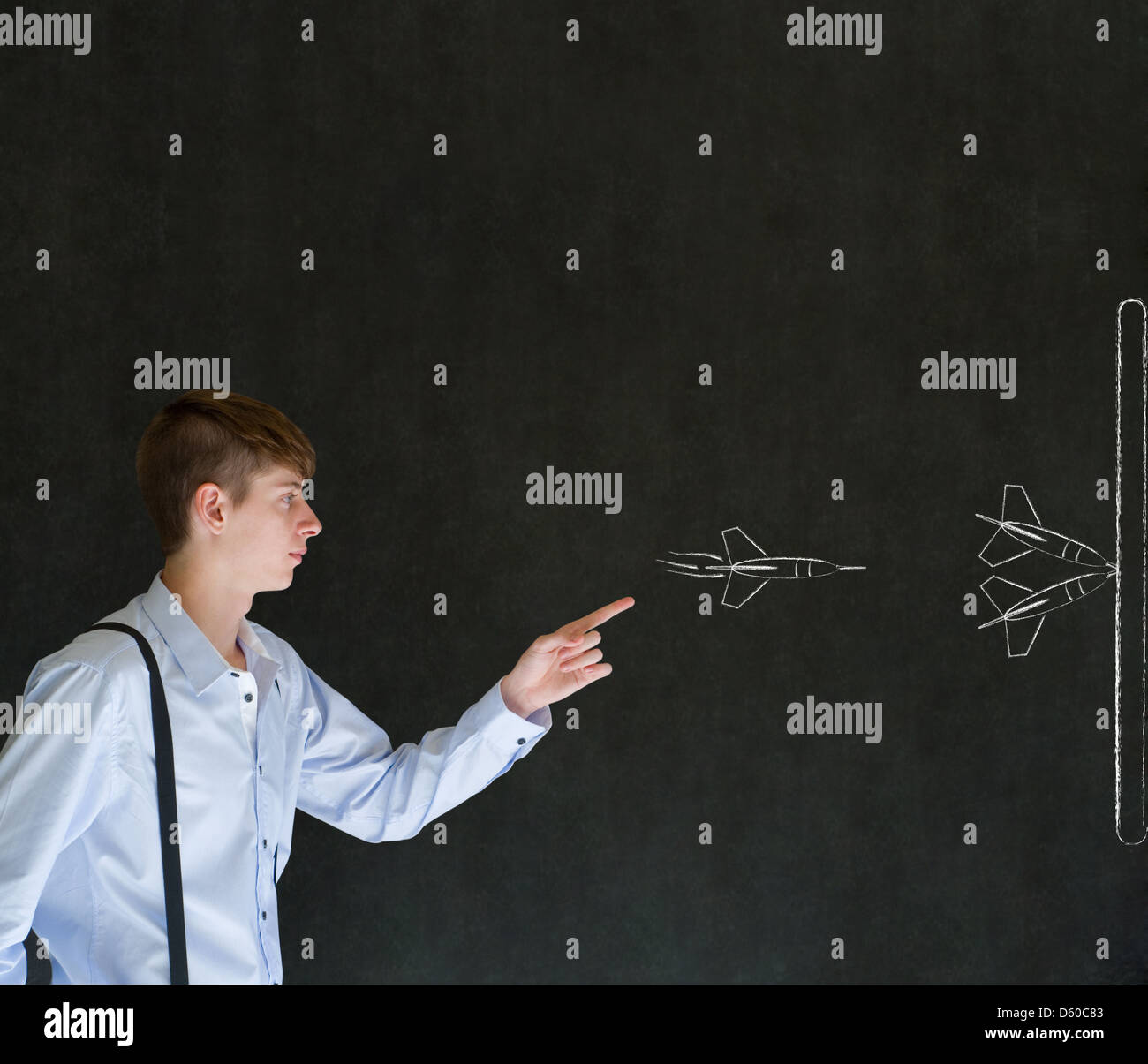 Business man, student or teacher throwing chalk strategy darts on