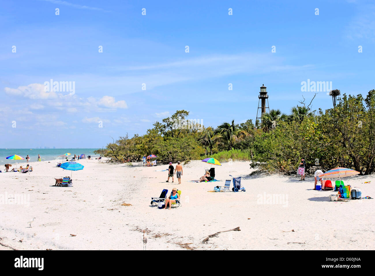 People enjoying Sanibel Island beach on the Gulf of Mexico coastline of Florida Stock Photo