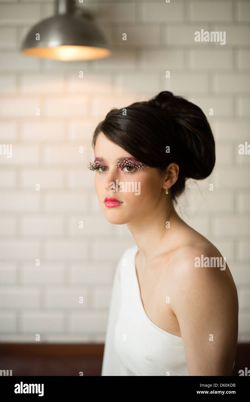 A beautiful young woman teenage girl with 1960's style hair, clothes and makeup, big eyelashes, UK Stock Photo - Alamy A beautiful young woman teenage girl with 1960's style hair, clothes and makeup, big eyelashes, UK Stock Photo - Alamy