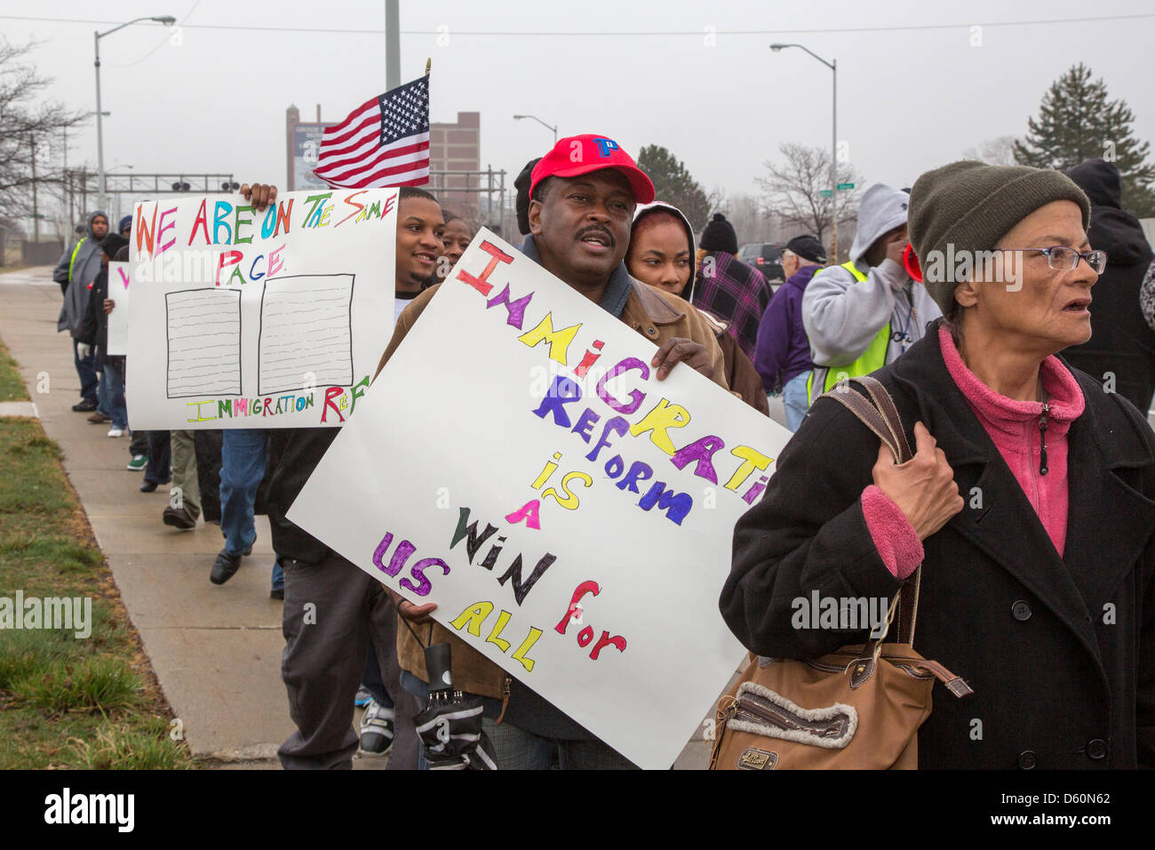 Detroit, Michigan, USA. Labor groups picket the office of the U.S. Citizenship and Immigration Services, calling for Congressional passage of immigration reform legislation. Credit: Jim West / Alamy Live News Stock Photo