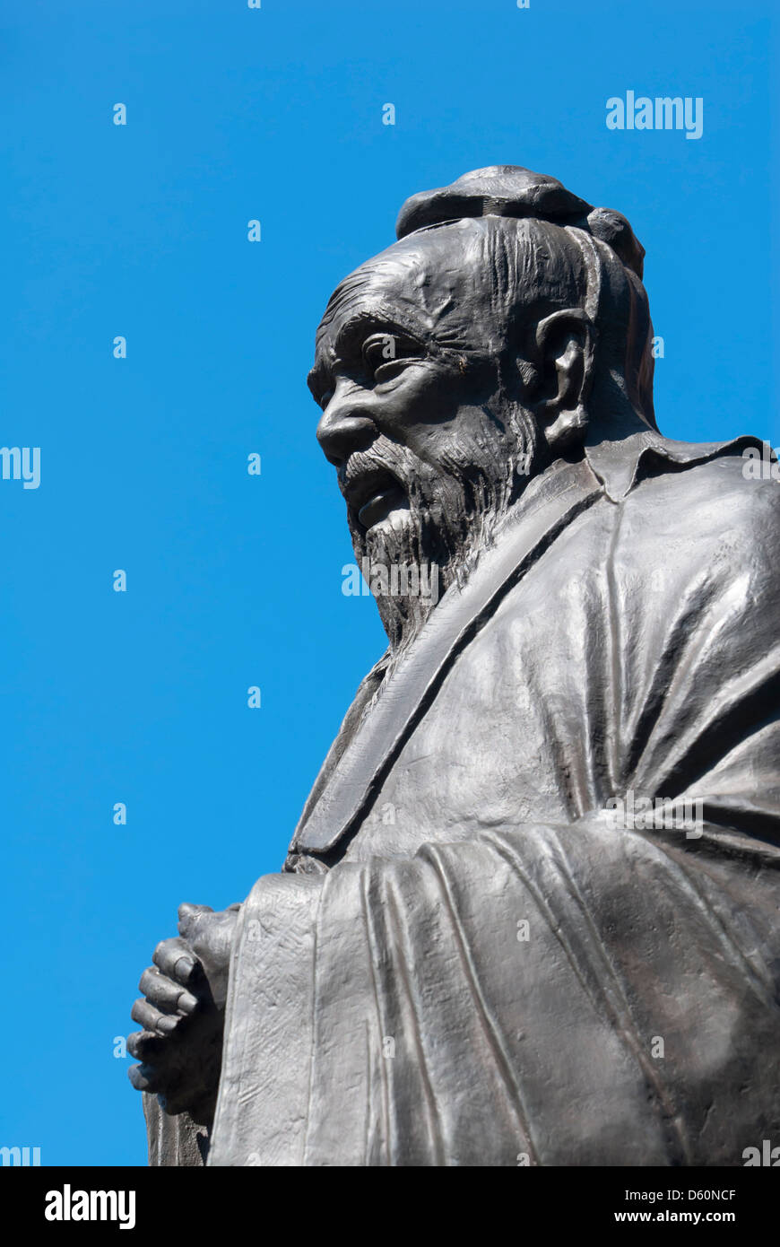 Statue of Confucius, Confucius Plaza, Chinatown, Manhattan, New York City, New York, USA - Image taken from public ground Stock Photo