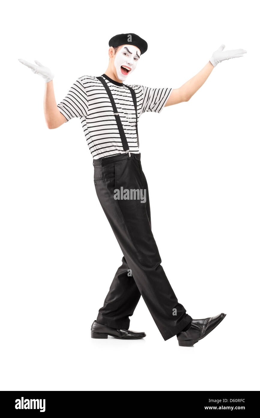 Full length portrait of a male mime dancer gesturing with hands