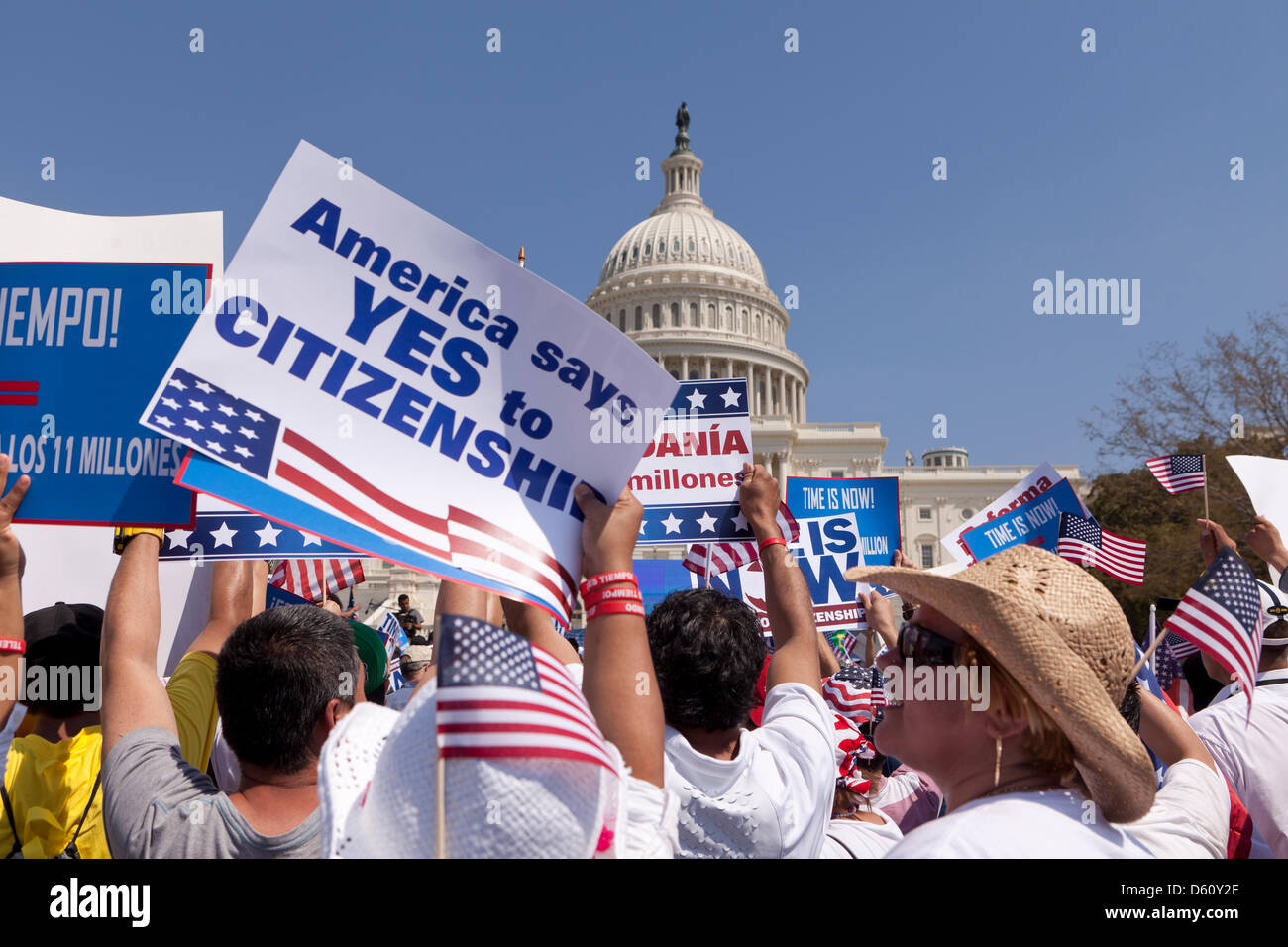 Large crowd waving Mexican and American flags at an immigration rally in Washington DC Stock Photo
