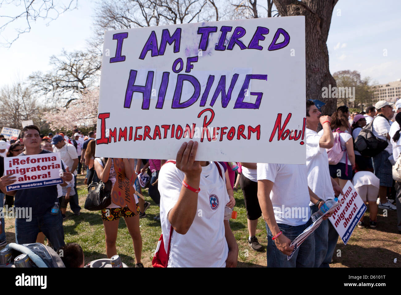 Man holding placard at immigration reform rally - Washington, DC USA Stock Photo