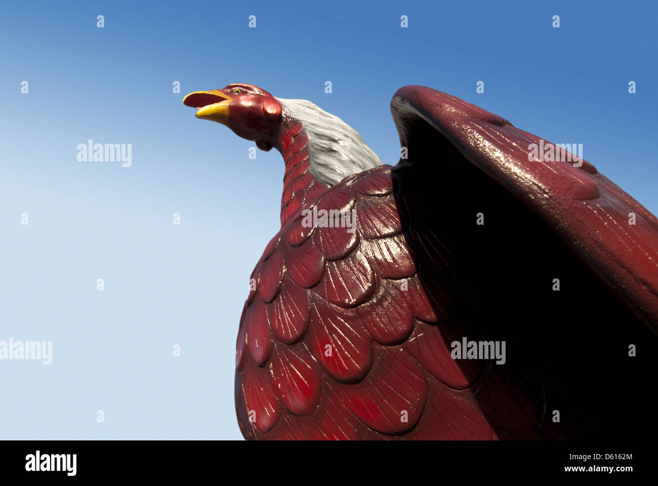 Giant garnet and black rooster stands outside the Mellow Mushroom in Columbia, South Carolina, USA Stock Photo