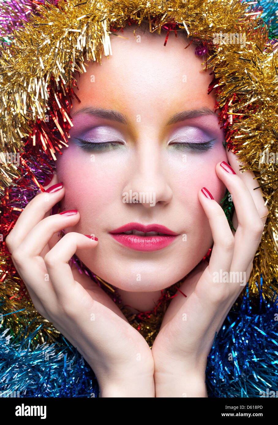 Woman in tinsel Christmas costume Stock Photo Alamy