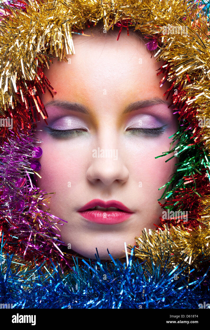 Woman in tinsel Christmas costume Stock Photo Alamy