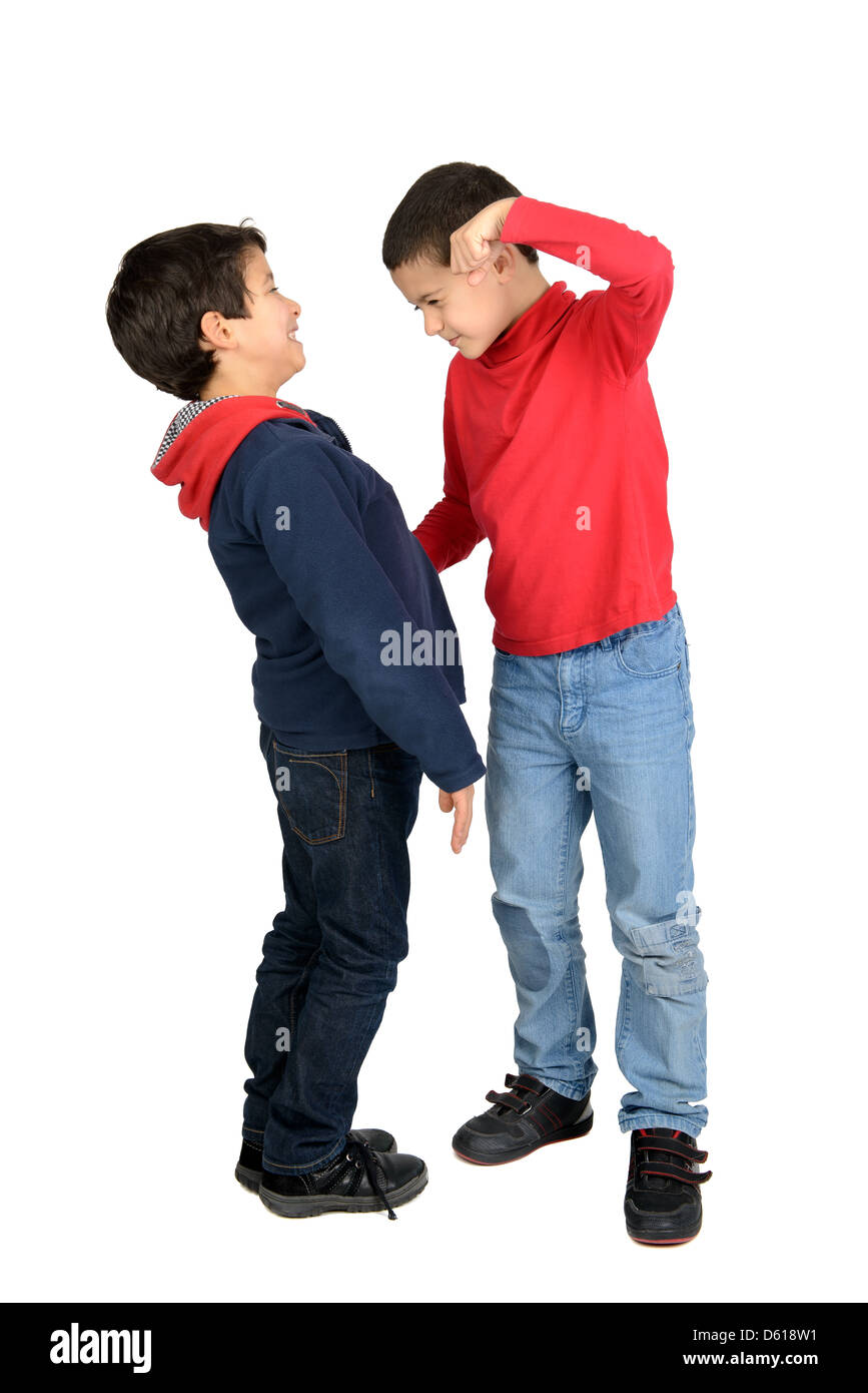 Boy bullying a smaller kid isolated in white Stock Photo