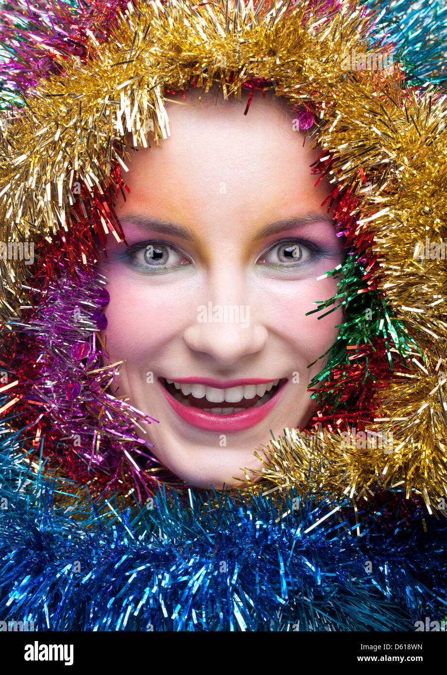 Woman in tinsel Christmas costume Stock Photo Alamy