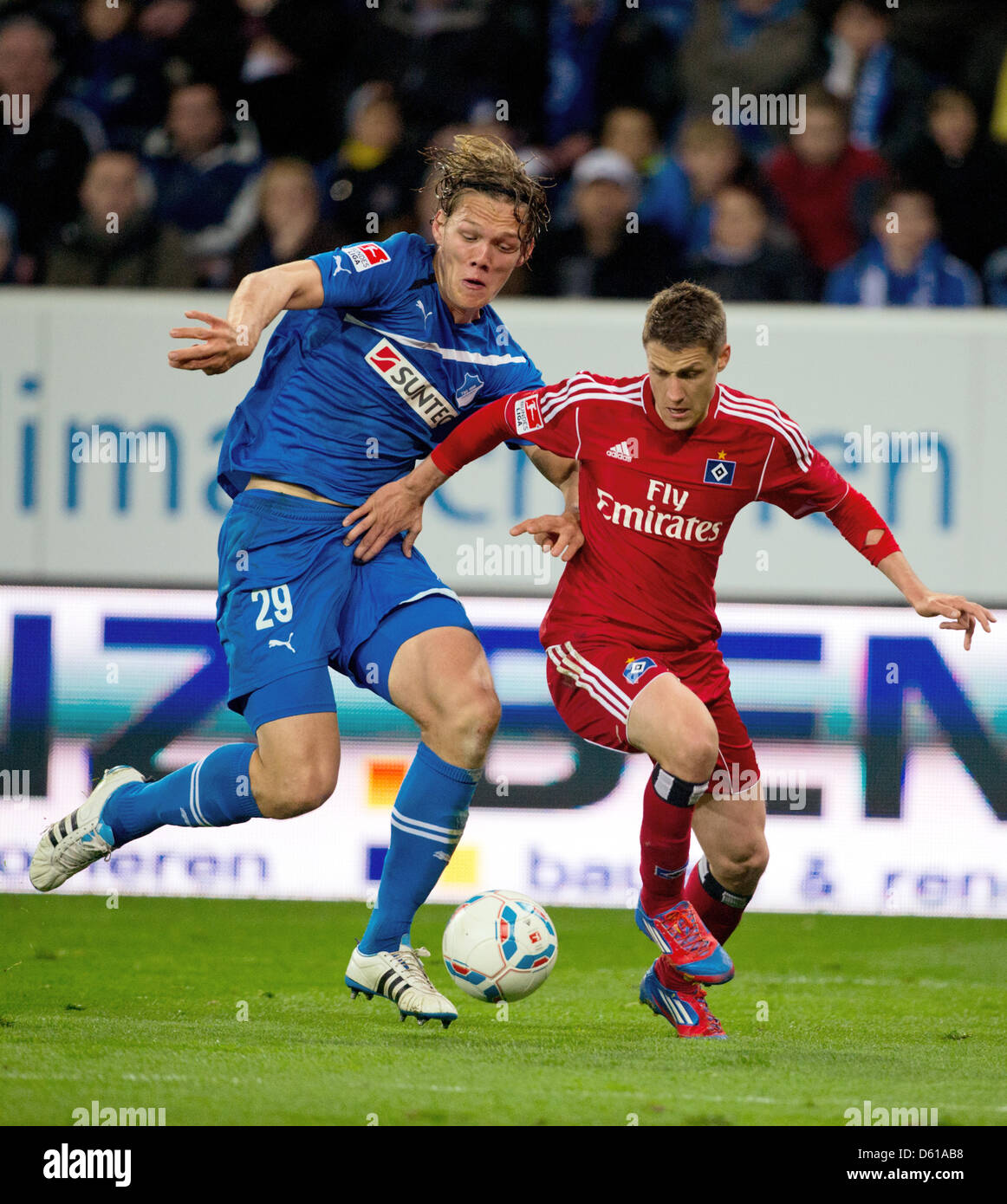 Hoffenheim S Jannik Vestergaard L Vies For The Ball With Hamburg S Ivo Ilicevic During The German Bundesliga Match Between 1899 Hoffenheim And Hamburger Sv At Rhein Neckar Arena In Sinsheim Germany 11 April 2012