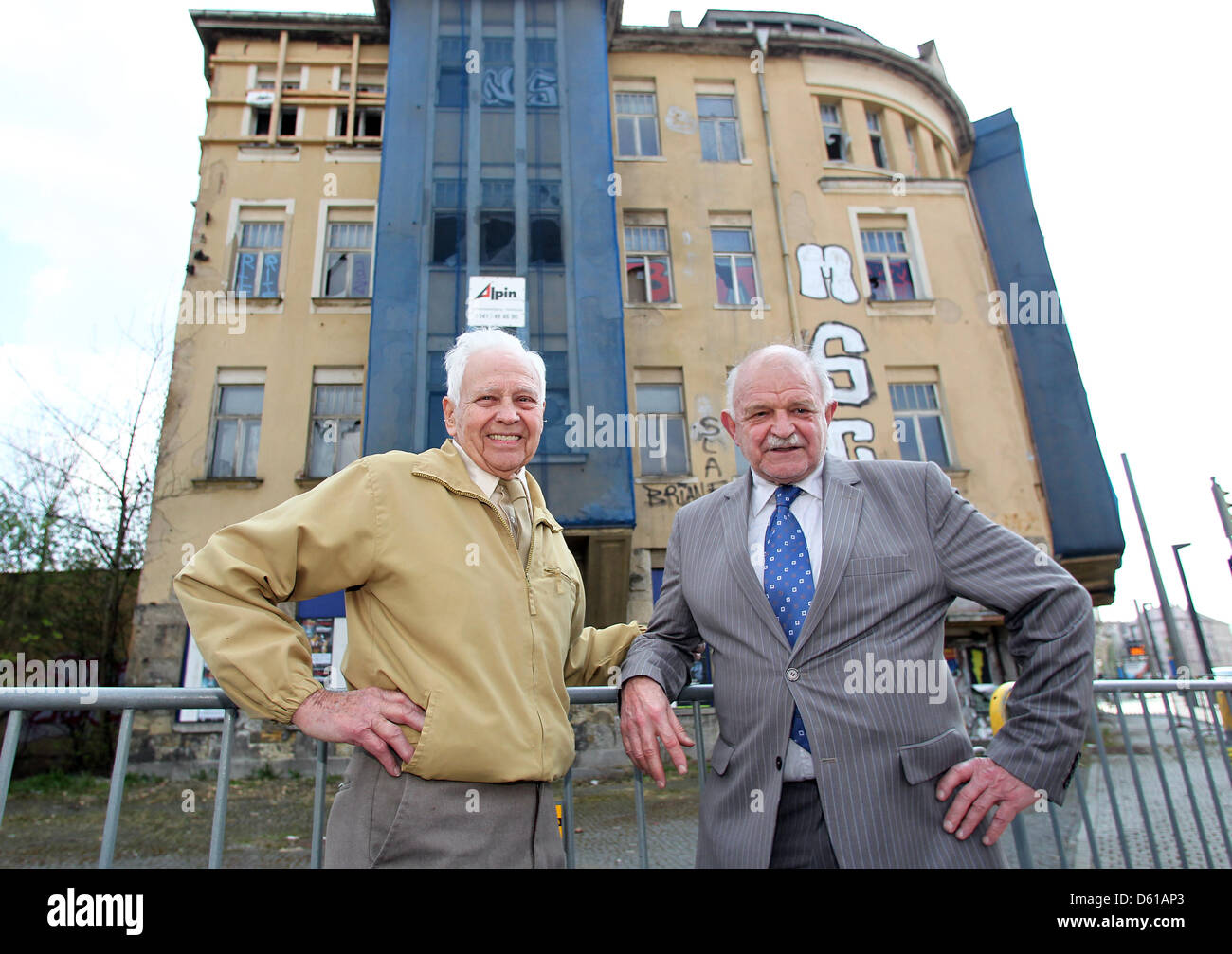 US veteran Lehman Riggs (L) and former tenant Robert Petzold stand in front of the so-calles Capa House in Leipzig, Germany, 12 April 2012. 92 year old Riggs belonged to a US Army unit during World War II which suffered the war's 'last casualties' during the storming of Leipzig. War photographer Capa took a picture of dead US soldier Bowman on 18 April 1945 who was shot on a balcon Stock Photo