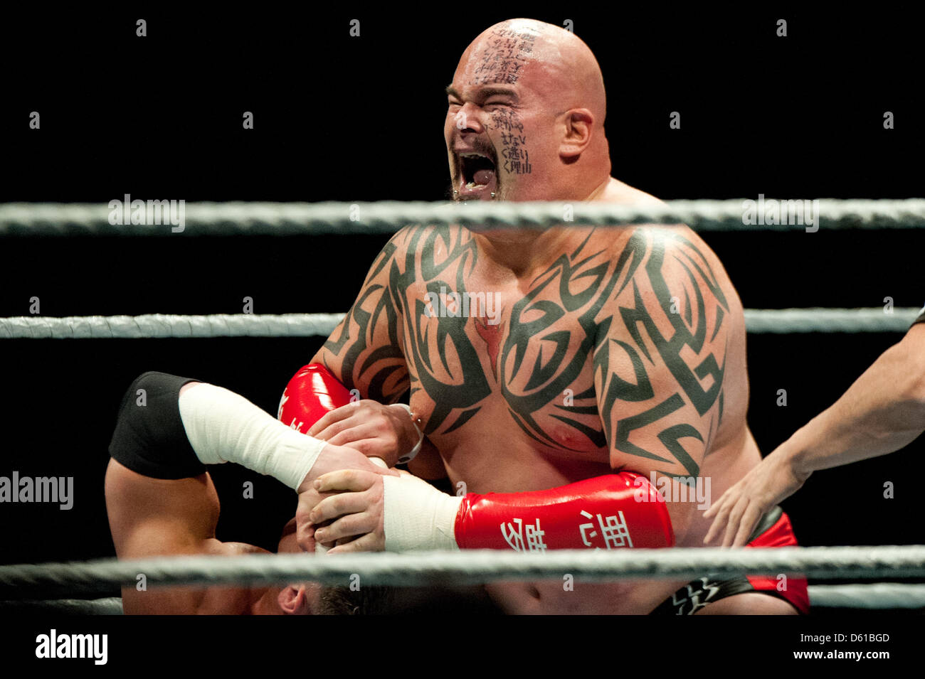 US-wrestler Lord Tensai fights in the wrestling ring during the RAW WrestleMania Revenge Tour at the o2 World canue in Berlin, Germany, 14 April 2012. The WWE (World Wrestling Entertainment) celebrates its 20th German anniversary this April. The first show in Germany was staged in Kiel, Germany, in April 1992. Photo: Sebastian Kahnert Stock Photo