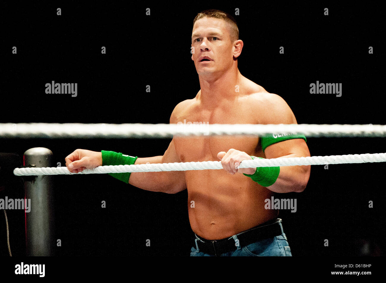 US-wrestler John Cena holds on to the ropes of the wrestling ring during a fight in the RAW WrestleMania Revenge Tour at the o2 World canue in Berlin, Germany, 14 April 2012. The WWE (World Wrestling Entertainment) celebrates its 20th German anniversary this April. The first show in Germany was staged in Kiel, Germany, in April 1992. Photo: Sebastian Kahnert Stock Photo