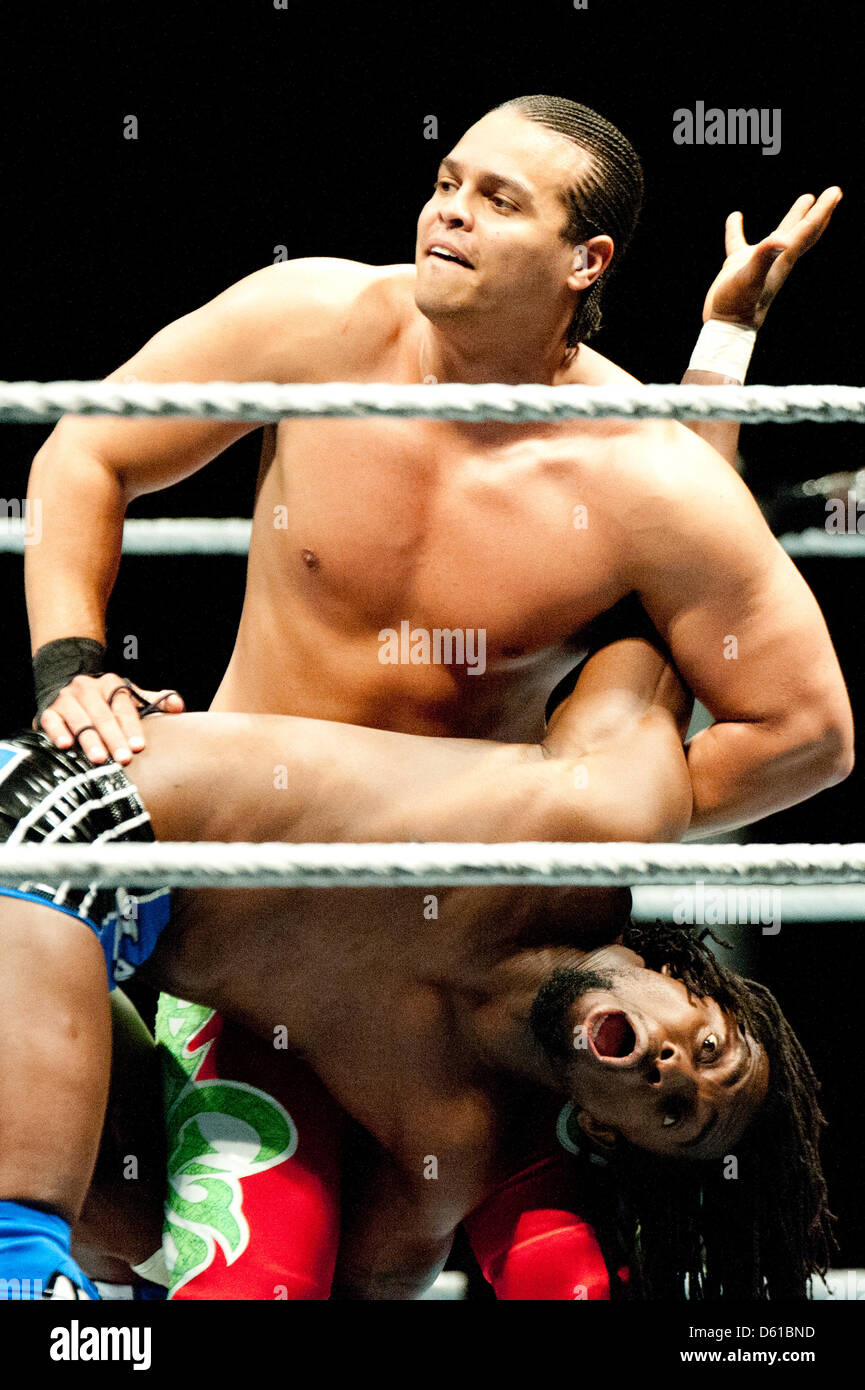 Porturican wrestler Epico (top) and Ghanaian wrestler Kofi Kingston are locked in a fight at the RAW WrestleMania Revenge Tour at the o2 World canue in Berlin, Germany, 14 April 2012. The WWE (World Wrestling Entertainment) celebrates its 20th German anniversary this April. The first show in Germany was staged in Kiel, Germany, in April 1992. Photo: Sebastian Kahnert Stock Photo