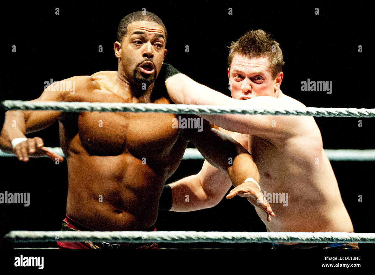 US-wrestlers David Otunga (L) and The Miz are locked in a fight at the RAW WrestleMania Revenge Tour at the o2 World canue in Berlin, Germany, 14 April 2012. The WWE (World Wrestling Entertainment) celebrates its 20th German anniversary this April. The first show in Germany was staged in Kiel, Germany, in April 1992. Photo: Sebastian Kahnert Stock Photo