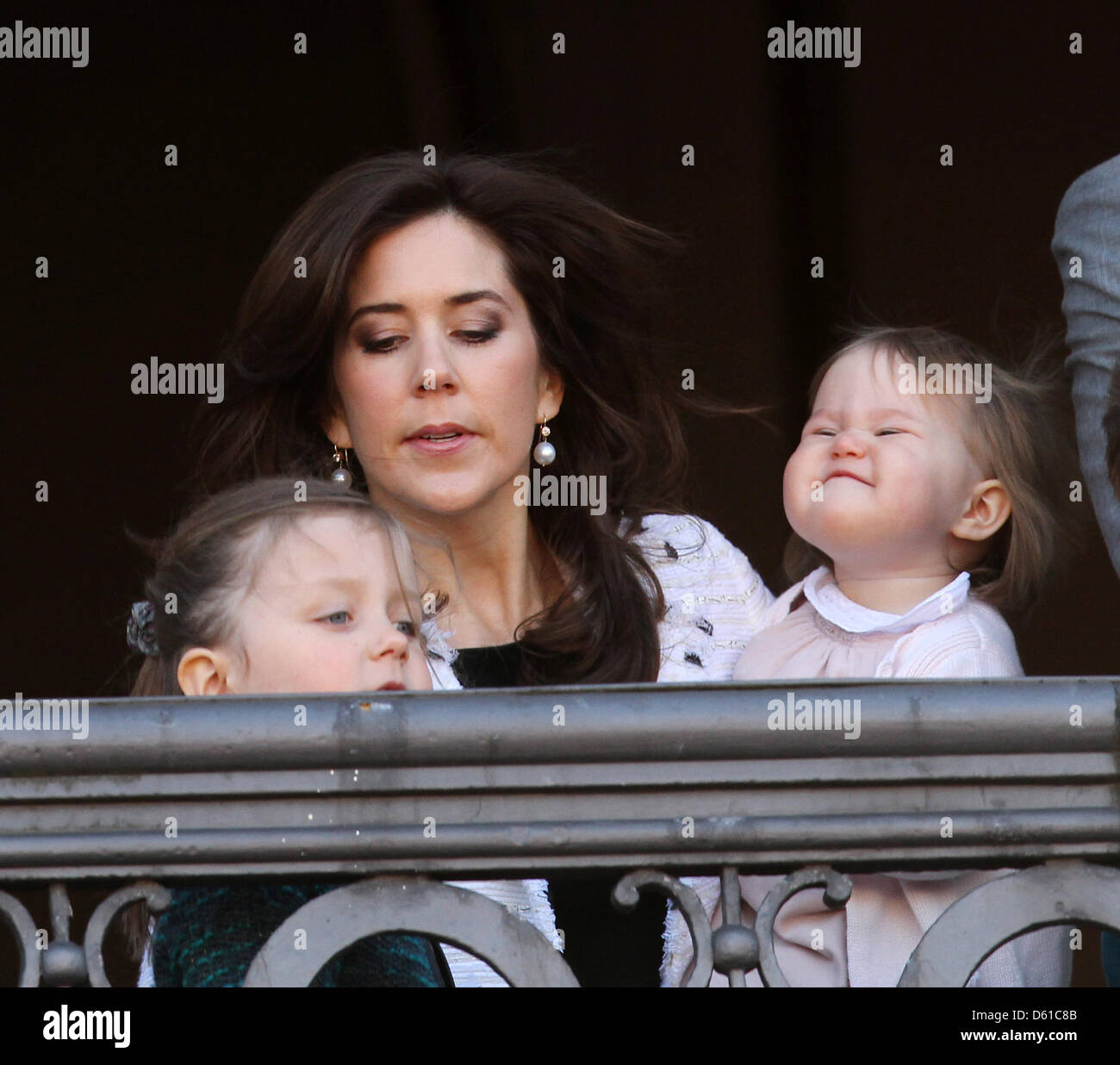 Danish Crown Princess Mary and her daughters Josephine (R) and Isabella (front) stand on the balcony of Amalienborg Palace to celebrate the 72nd birthday of Queen Margrethe in Copenhagen, Denmark, 16 April 2012. Photo: Patrick van Katwijk NETHERLANDS OUT Stock Photo