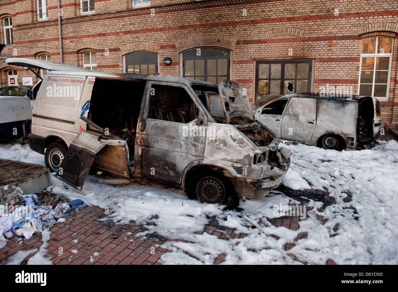 Four burnt out cars are pictured at Koepenicker Street in Berlin, Germany, 16 April 2012. The cars were set on fire on the premises of a company for graffitti removals offering an emergency service on 01 May 2012.  Photo: Robert Schlesinger Stock Photo