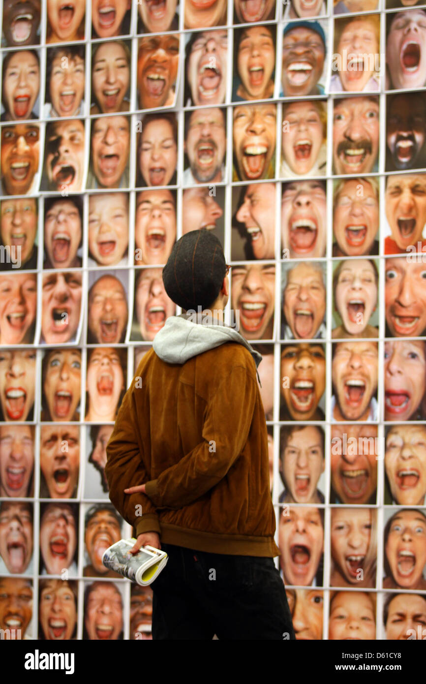 A man stands in front of the work 'Schrei' by Herlinde Koelbl at the booth of the galery Rieder  at the Art Cologne in Cologne, Germany, 17 April 2012. The Art Cologne fair will open from 18 to 22 April. Photo: OLIVERB BERG Stock Photo