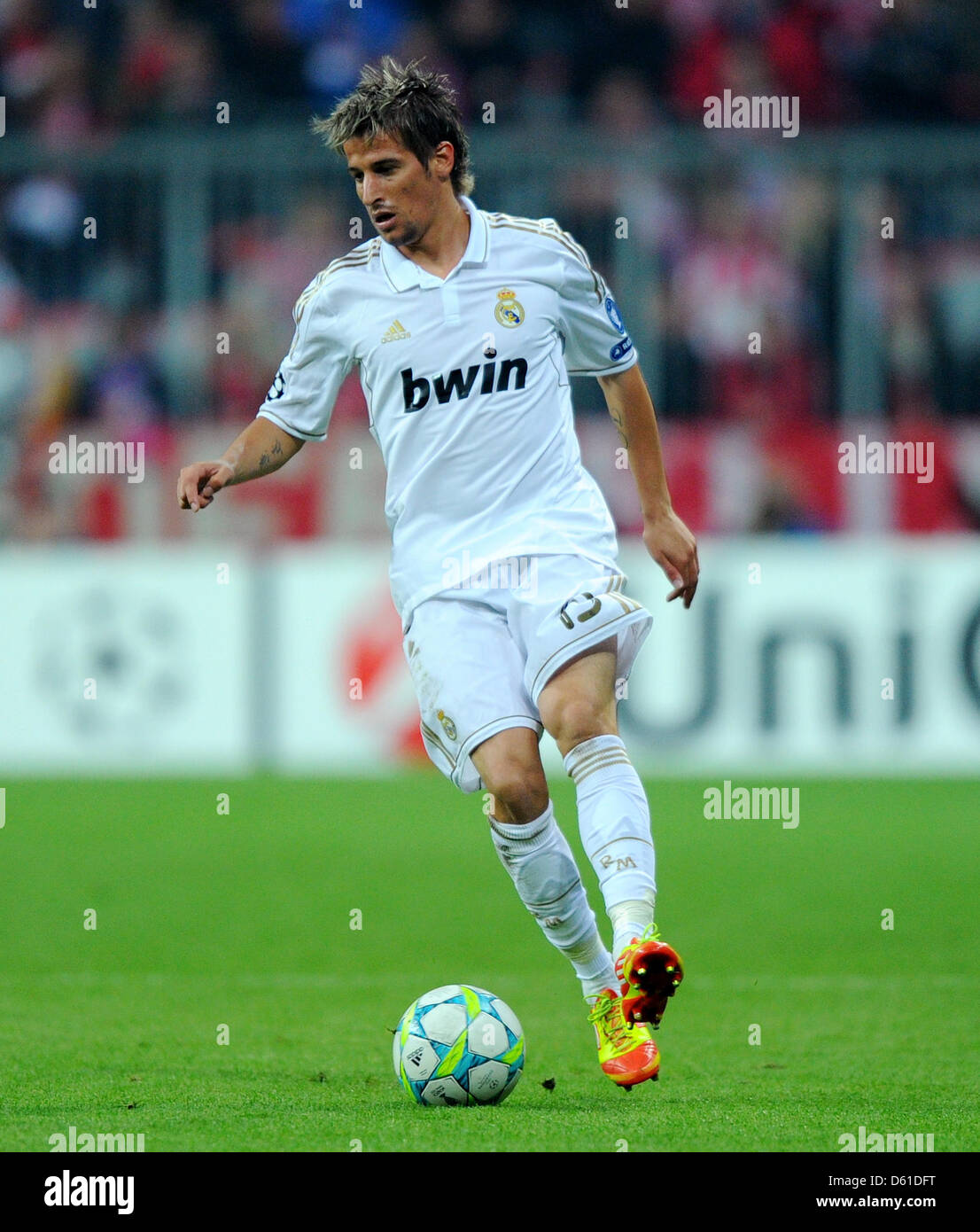 Madrid's Fabio Coentrao plays the ball during the first leg of the  UEFA Champions league semi final between FC Bayern Munich and Real madrid at the Allianz Arena in Munihc, Germany, 17 April 2012. Photo: Thomas Eisenhuth Stock Photo