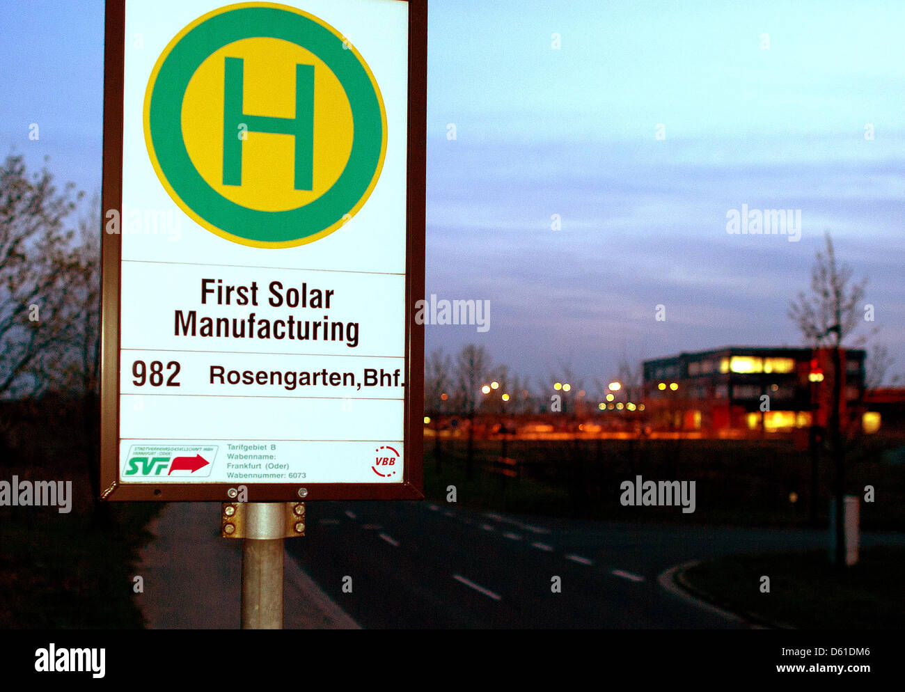 A bus stop sign at the plant of US company First Solar is pictured in Frankfurt Oder, Germany, 17 April 2012. First Solar announced on the same day that they were closing the plant which employed 1200 people. The plant will close at the end of October, shortly after a five-year job guarantee will have expired which the company agreed to in order to receive 45 million euros in subsi Stock Photo