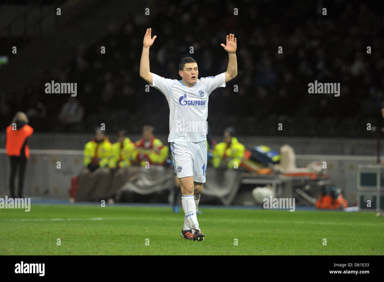 FILE - A file photo dated 09 December 2011 shows Schalke's Kyriakos Papadopoulos raising his arms during the German Bundesliga soccer match between Hertha BSC and FC Schalke 04 at the Olympic Stadium in Berlin, Germany. Photo: Oliver Mehlis Stock Photo