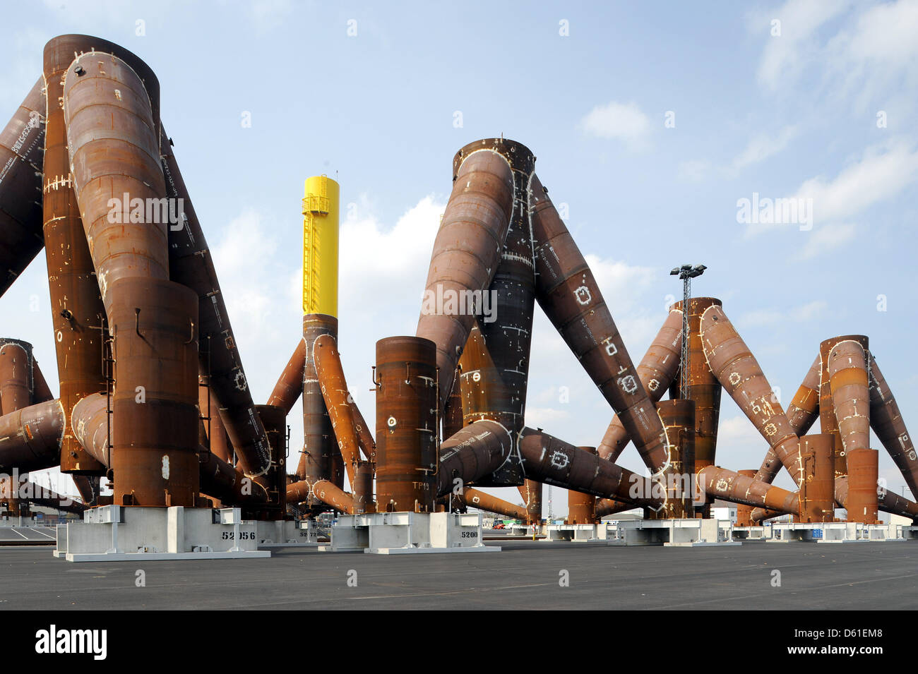 Gigantic tripods of offshore construction company 'WeserWind Ltd.' are ready to be shipped in Bremerhaven, Germany, 17 April 2012. The steel tripods weigh 900 tons and will be used as base for offshore wind turbines in the North Sea and Baltic Sea. Photo: INGO WAGNER Stock Photo