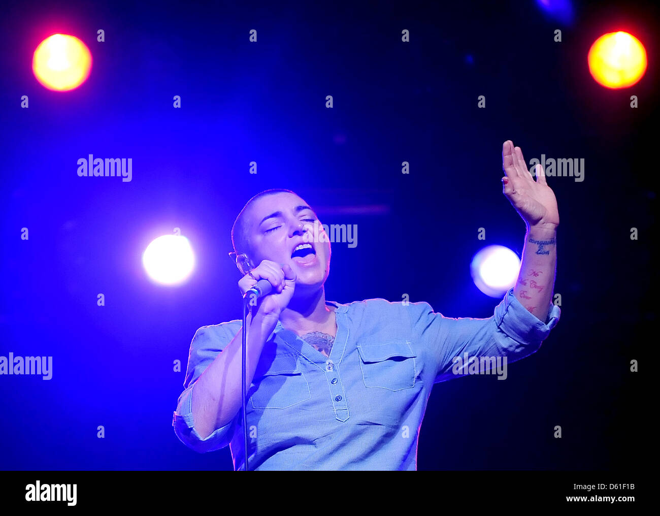 Irish singer song-writer  Sinéad O'Connor stands on stage as she performs during her concert at the Astra Kulturhaus venue in Berlin, Germany, 19 April 2012. O'Connor will continuer her tour with one more German concert in Munich. Photo: Britta Pedersen Stock Photo