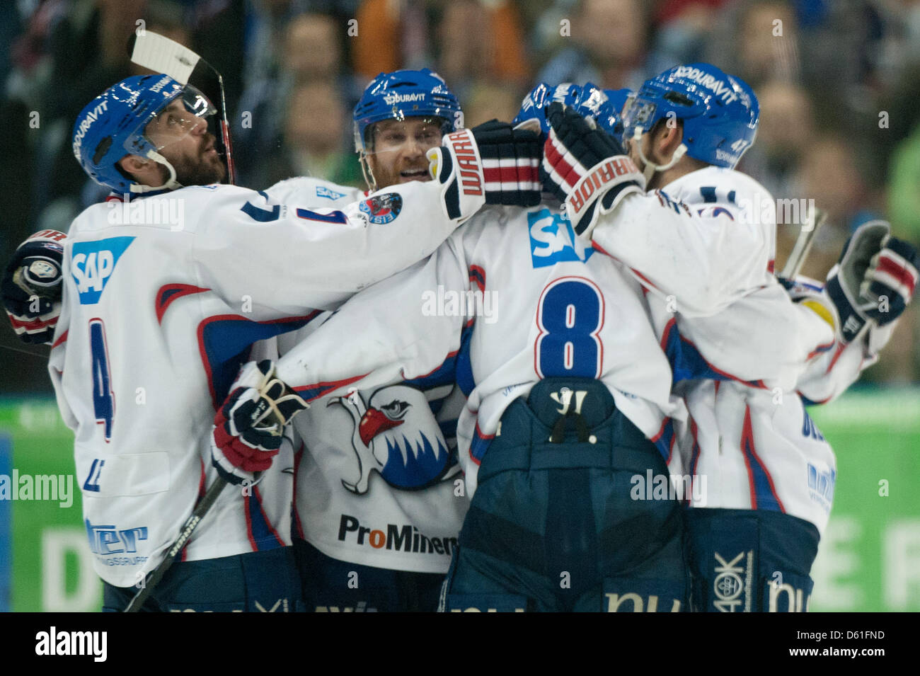 Mannheim's players celebrate the 1-2 goal and final result during the ice hockey DEL play off finals between Berlin Polar Bears and Mannheim Eagles at O2 World in Berlin, Germany, 20 April 2012. Photo: Sebastian Kahnert Stock Photo