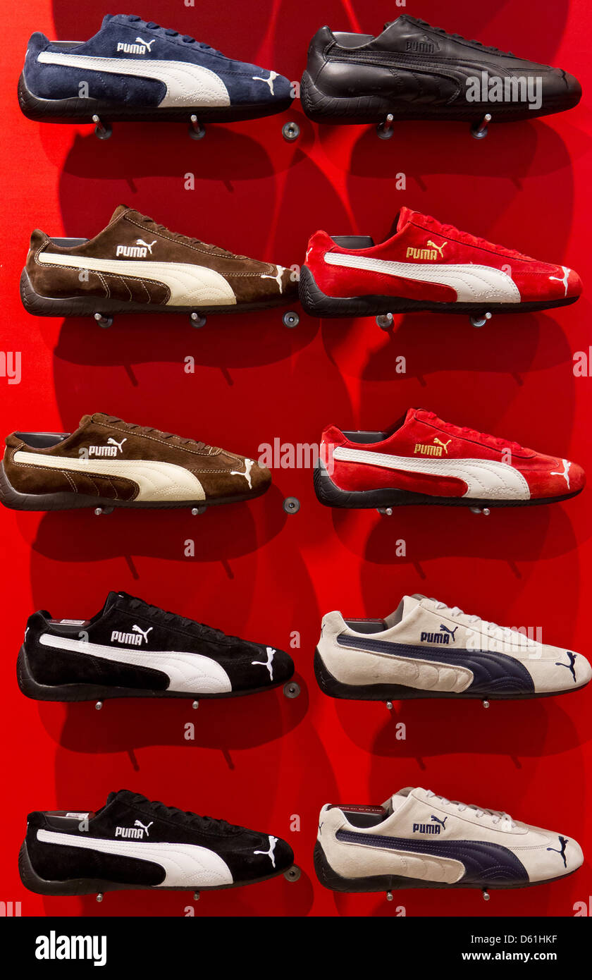 Shoes of the sportswear manufacturer Puma are displayed in a store in Herzogenaurach, Germany, 24 April 2012. In 2011, Puma reached the three euro turnover mark for the first time. The