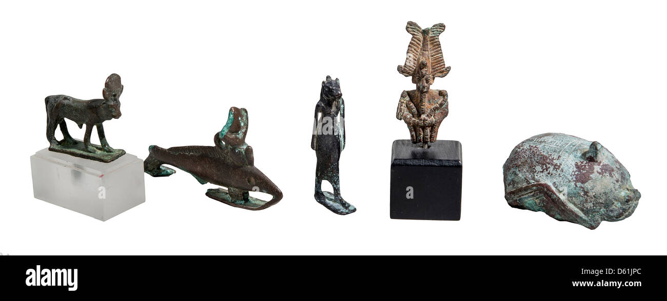 Five Egyptian bronze figurines 1st millennium BCE Stock Photo
